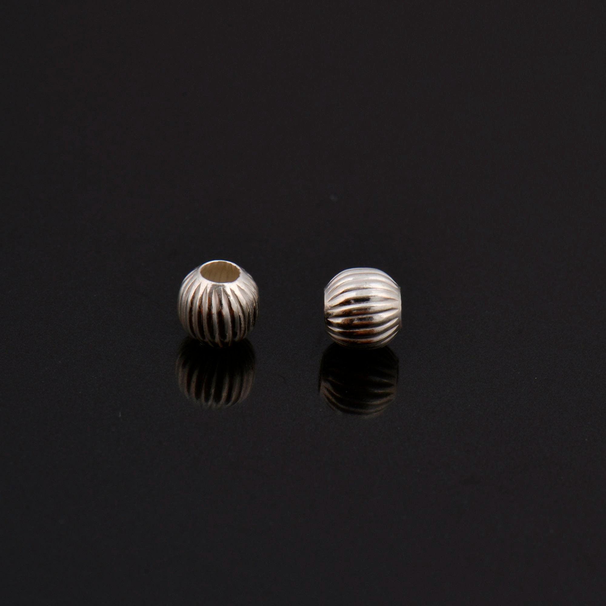 Sterling Silver Corrugated 3mm Round Beads.
