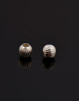 Sterling Silver Corrugated 3mm Round Beads.